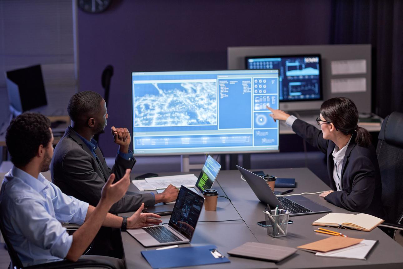 IT professionals collaborating in an office