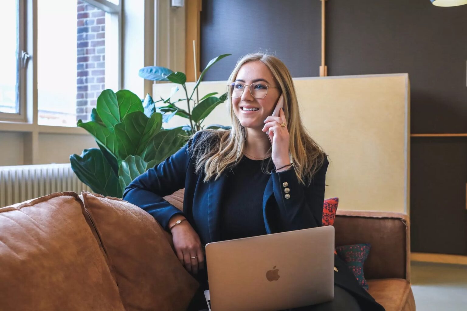 Professional working remotely with laptop